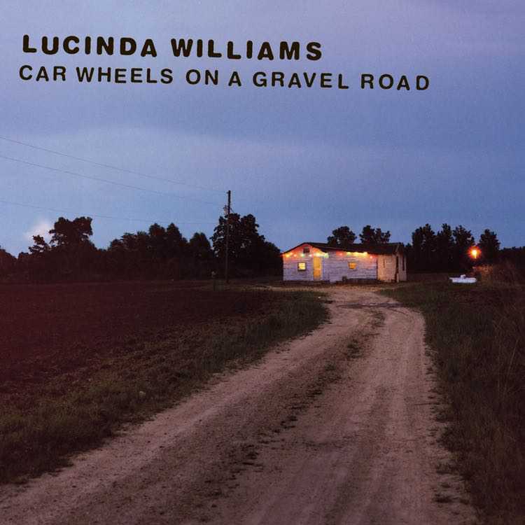 Car Wheels On A Gravel Road