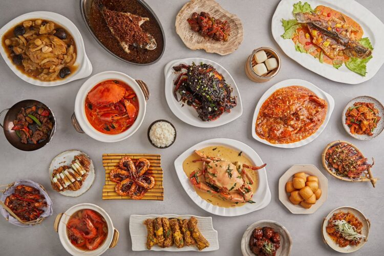 Assorted crab dishes including chilli, butter and black pepper crab with mantou and prawns at Mellben Seafood, Ang Mo Kio.