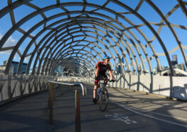 Cycling across Webb Bridge (Photo: ChameleonsEye / Shutterstock.com)