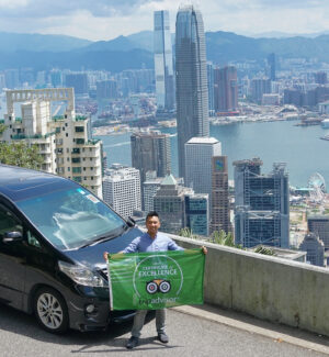 hong kong city car man with green flag