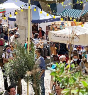 Stalls selling handcrafted jewellery, ceramics, textiles and souvenirs at Rosenhof Market in Zurich&rsquo;s Old Town.