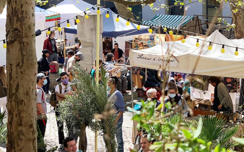 Stalls selling handcrafted jewellery, ceramics, textiles and souvenirs at Rosenhof Market in Zurich&rsquo;s Old Town.
