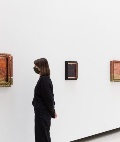 A visitor viewing the art gallery